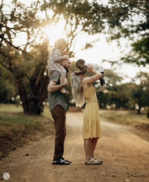 Farrell Family holding up child